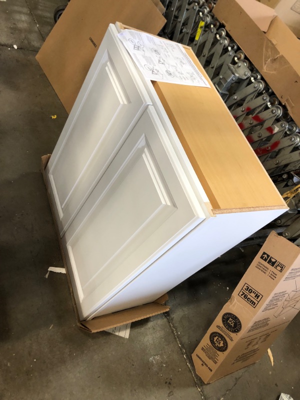 Photo 1 of Hampton Bay Hampton Satin White Raised Panel Stock Assembled Wall Kitchen Cabinet (27 in. x 30 in. x 12 in.)