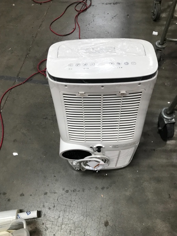 Photo 3 of COULD NOT GET IT TO TURN ON
Honeywell 15,000 BTU Portable Air Conditioner with Dehumidifier & Fan Cools Rooms Up To 775 Sq. Ft. with Remote Control, HJ5CESWK0, White/Black

DOES NOT BLOW