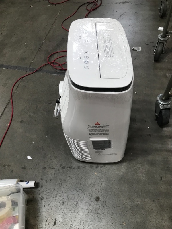 Photo 4 of COULD NOT GET IT TO TURN ON
Honeywell 15,000 BTU Portable Air Conditioner with Dehumidifier & Fan Cools Rooms Up To 775 Sq. Ft. with Remote Control, HJ5CESWK0, White/Black

DOES NOT BLOW