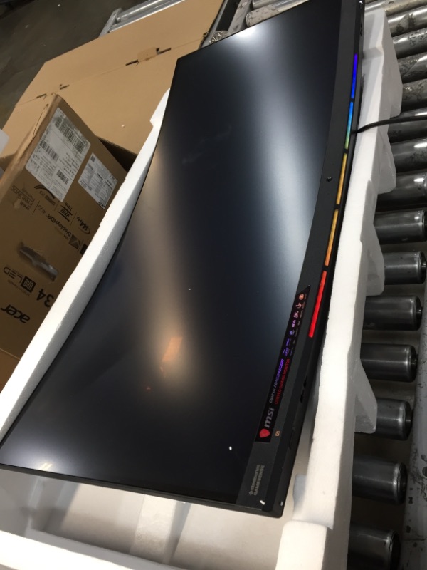 Photo 5 of MSI 32" Full HD RGB LED Non-Glare Super Narrow Bezel 1ms 2560 x 1440 144Hz Refresh Rate Free Sync Height Adjustable Curved Gaming Monitor (Optix MAG321CQR),Black
