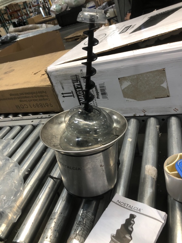 Photo 1 of Nostalgia NCFF986SS 4-Tier 2-Pound Stainless Steel Steel Chocolate Fondue Fountain, 2-lb
NEEDS CLEANING PARTS ONLY