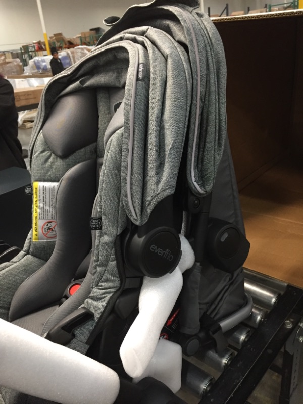 Photo 5 of Evenflo Pivot Xpand Modular Travel System with SafeMax Infant Car Seat
