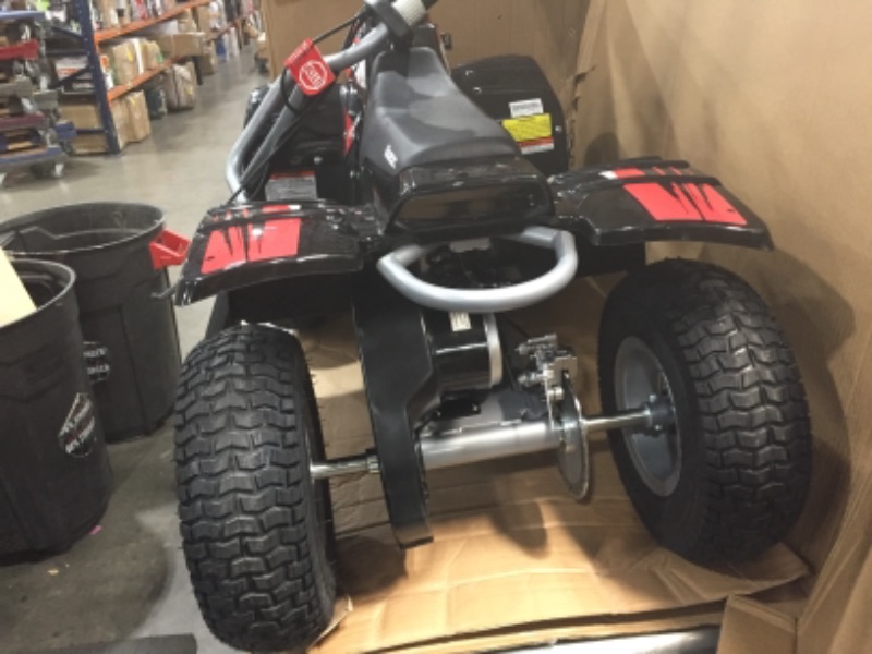 Photo 5 of Razor Dirt Quad - 24V Electric 4-Wheeler ATV - Twist-Grip Variable-Speed Acceleration Control, Hand-Operated Disc Brake, 12" Knobby Air-Filled Tires