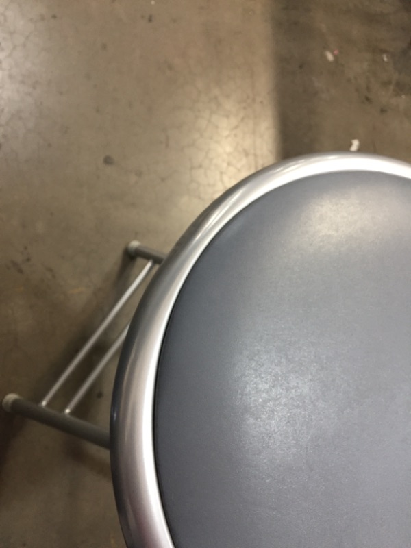 Photo 1 of 25" high foldable barstools (2 grey one black)