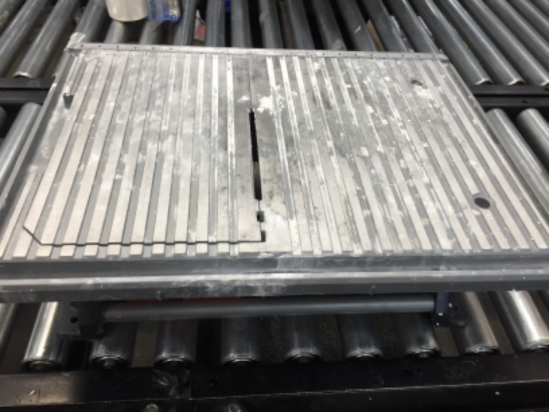 Photo 1 of Ridgid R4021 120-Volt 6.5 Amp Corded 7 Inch Self-Aligning Table Top Wet Tile Saw (New Open Box)