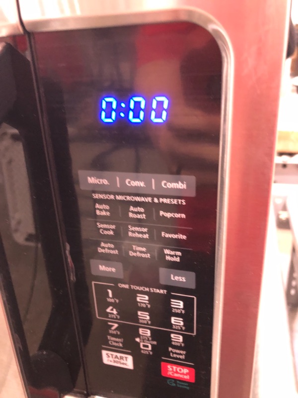 Photo 1 of Toshiba EC042A5C-SS Countertop Microwave Oven with Convection, Smart Sensor, Sound On/Off Function and LCD Display, 1.5 Cu.ft, Stainless Steel