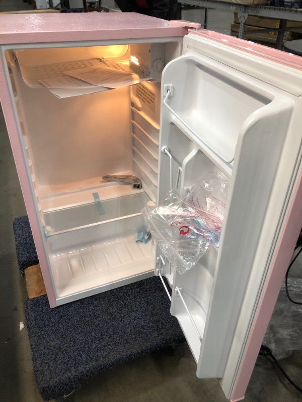 Photo 3 of FRIGIDAIRE EFR376 Retro Bar Fridge Refrigerator with Side Bottle Opener, 3.2 cu. Ft, Pink/Coral

WIRE CUT 
