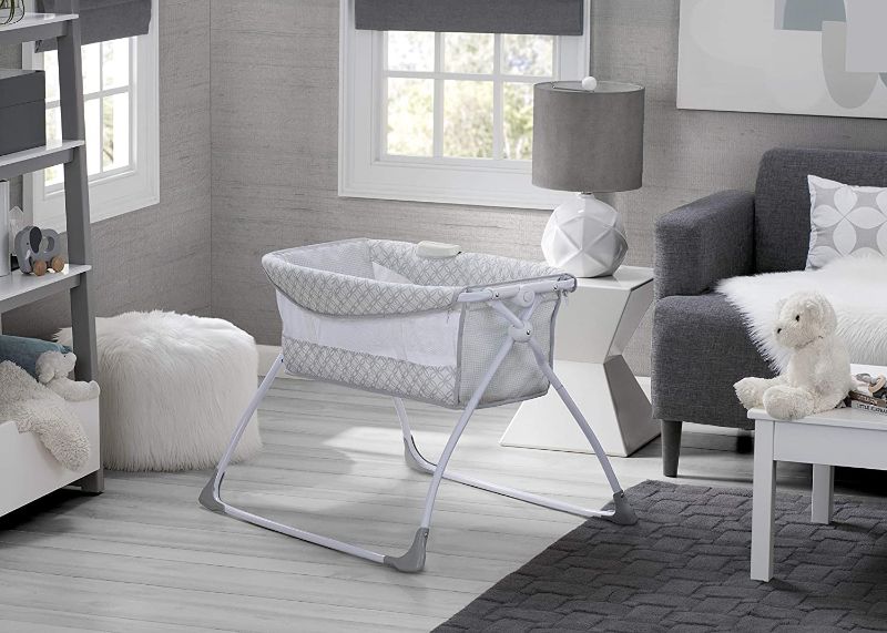 Photo 1 of Delta Children Newborn Soothing Sleeper Bassinet - Portable Baby Crib with Compact Fold, Grey Infinity  31.69”L x 26.77”W x 22.44”H
