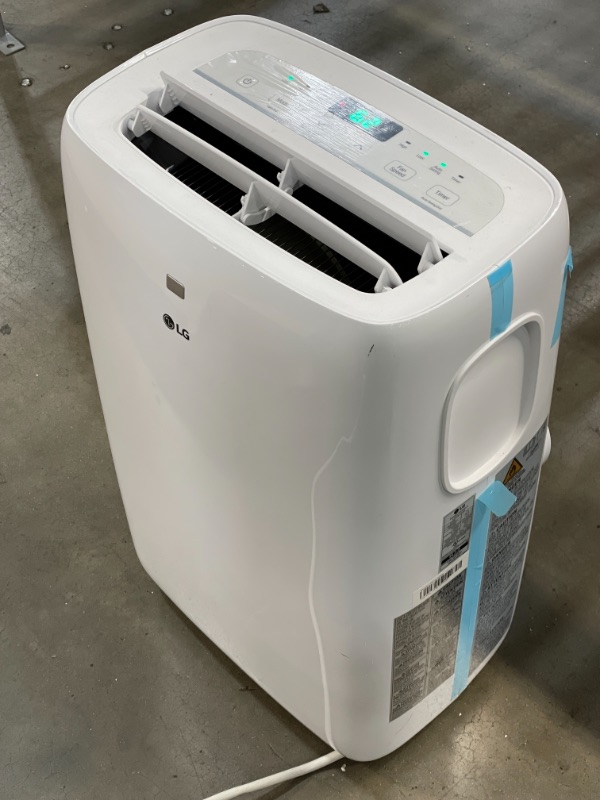 Photo 2 of LG 7,000 BTU (DOE) / 10,000 BTU (ASHRAE) Portable Air Conditioner, Cools 300 Sq.Ft. (12' x 25' room size), Quiet Operation, LCD Remote, Window Installation Kit Included, 115V
 13.27 x 17.32 x 27.36 inches
