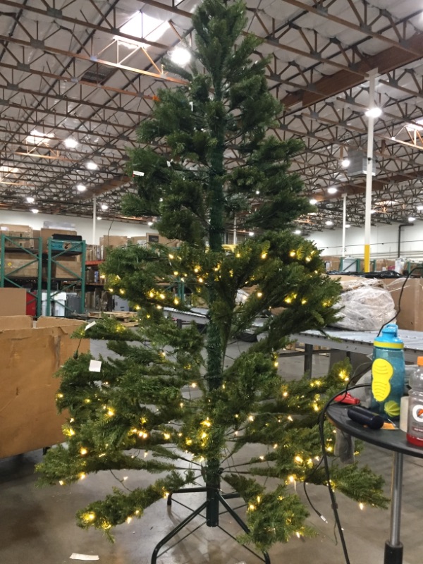 Photo 2 of National Tree Company Pre-Lit Artificial Full Christmas Tree, Green, Dunhill Fir, Dual Color LED Lights, Includes Stand, 9 Feet
** TOP HALF DOES NOT LIGHT UP***