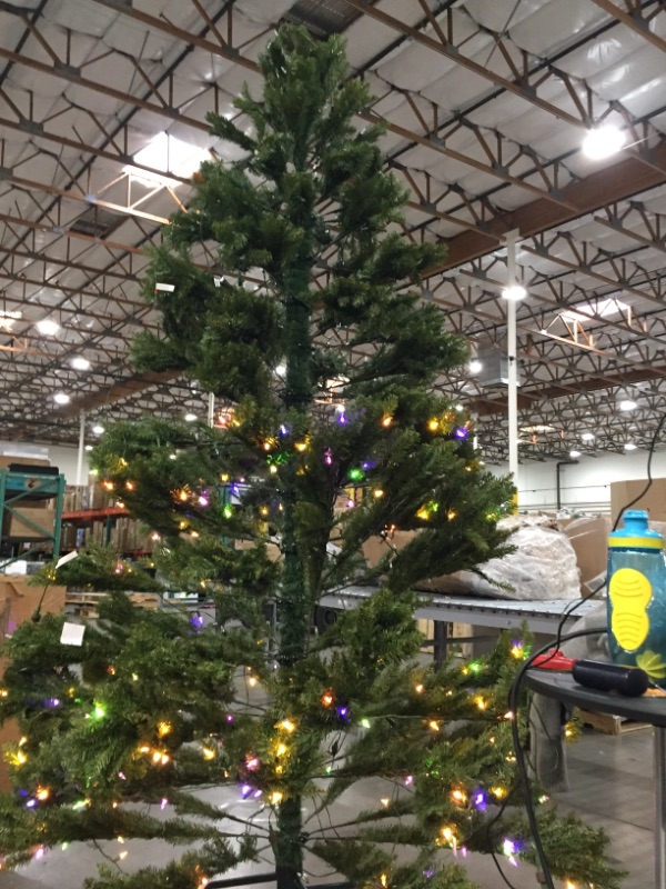 Photo 5 of National Tree Company Pre-Lit Artificial Full Christmas Tree, Green, Dunhill Fir, Dual Color LED Lights, Includes Stand, 9 Feet
** TOP HALF DOES NOT LIGHT UP***