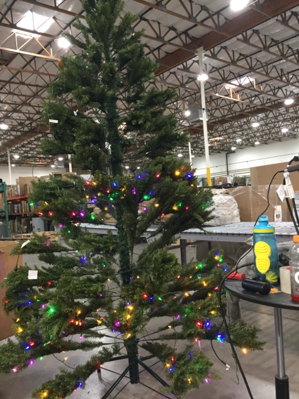 Photo 4 of National Tree Company Pre-Lit Artificial Full Christmas Tree, Green, Dunhill Fir, Dual Color LED Lights, Includes Stand, 9 Feet
** TOP HALF DOES NOT LIGHT UP***