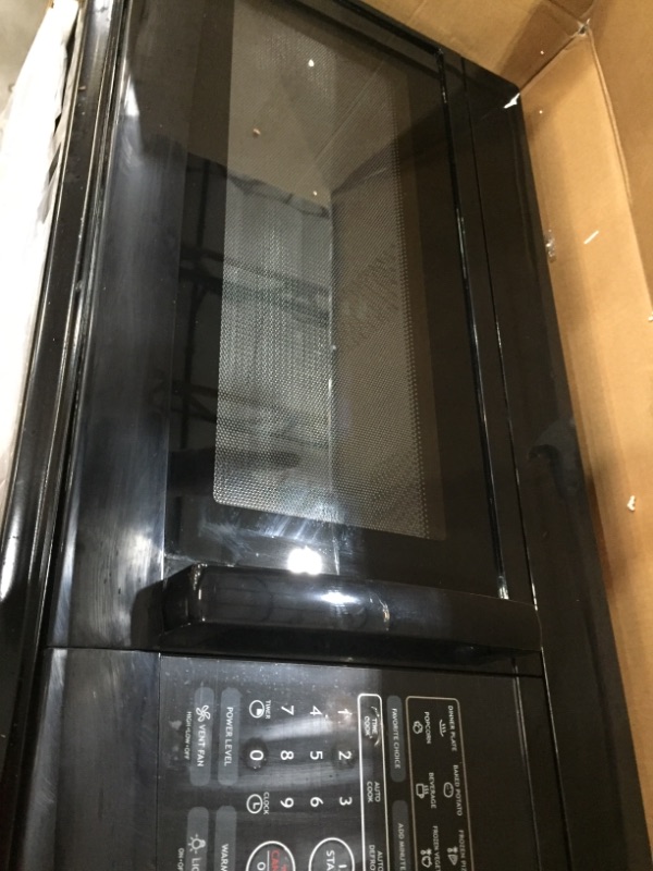 Photo 2 of 1.6 cu. ft. Over the Range Microwave in Black
***minor scratches***