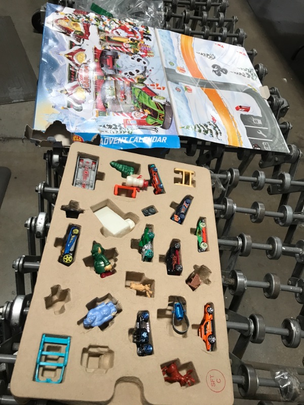 Photo 1 of Hot Wheels Advent Calendar 24 Day Holiday Surprises with Cars and Accessories Ages 3 and Older
