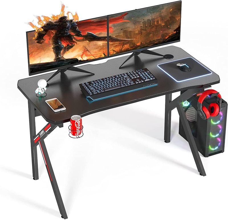 Photo 1 of Gaming Desk 47 inch PC Computer Desk, Gaming Table Gamer Workstation, K Shaped Home Office Study Desk Table, Racing Style Game Station with Carbon Fiber Surface, Cup Holder, Headphone Hook, Black Red
