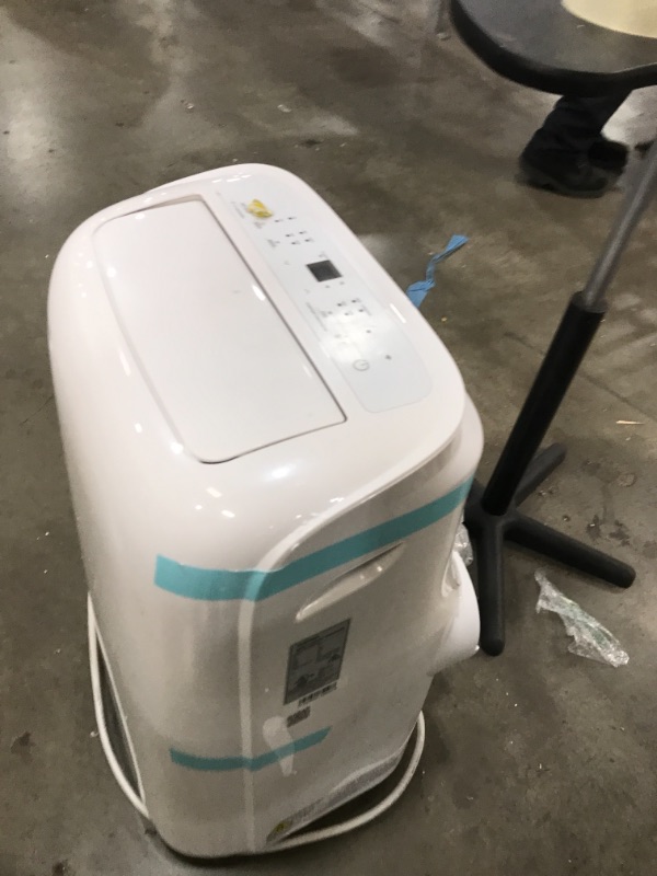 Photo 1 of 10,000 BTU (7,000 BTU, DOE) 115-Volt Portable AC with Dehumidifier Function and Remote Control in White
