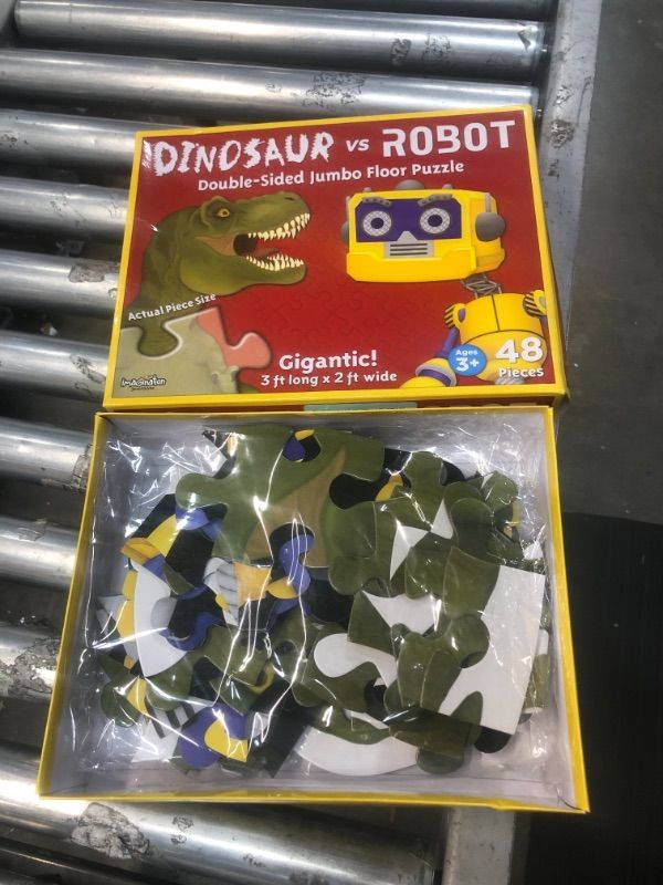 Photo 2 of Dinosaur vs. Robot 48 Piece Double Sided Floor Puzzle by - 3 ft x 2 ft, 2 puzzles in 1, just flip for more fun! Will you build the towering T-Rex or the.., By Imagination Generation
