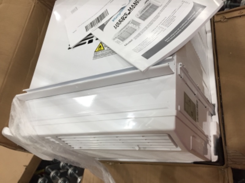 Photo 1 of 450 Sq. Ft. 10,000 BTU Window-Mounted Air Conditioner with Remote Control
**NOT FUNCTION, PLUGED IN, TURNS BACK OFF BY ITSELF**