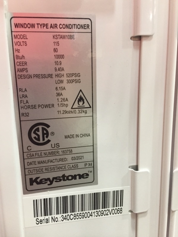 Photo 4 of 450 Sq. Ft. 10,000 BTU Window-Mounted Air Conditioner with Remote Control
**NOT FUNCTION, PLUGED IN, TURNS BACK OFF BY ITSELF**