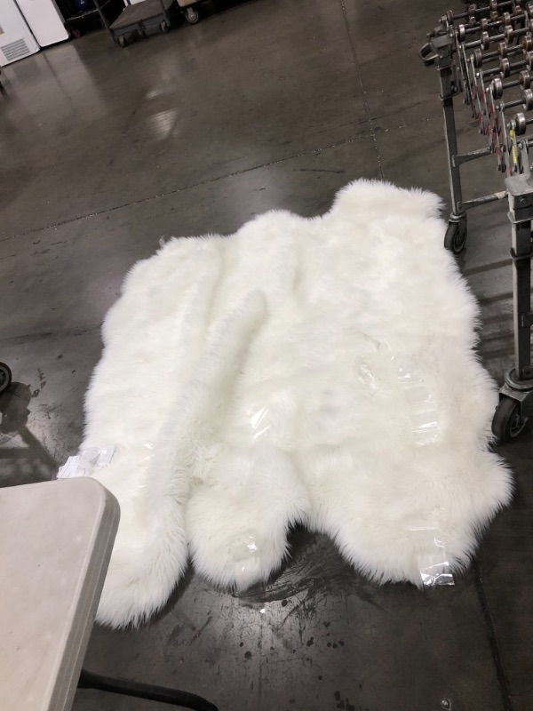 Photo 1 of nuLOOM Fluffy Faux Sheepskin Shag Area Rug, 5' 3" x 6', White
