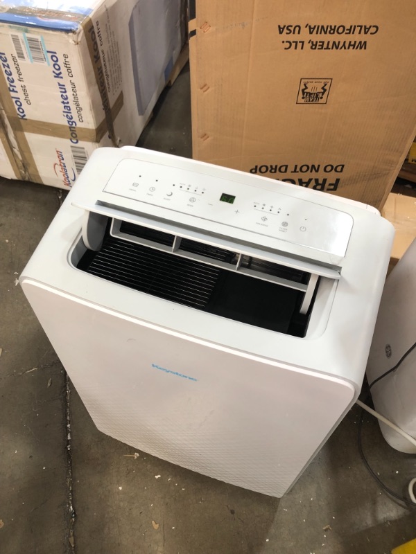 Photo 3 of 13,000 BTU (8,000 BTU DOE) Portable Air Conditioner with Dehumidifier in White