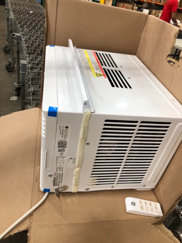 Photo 5 of GE Energy Star 10,000 BTU Smart Electronic Window Air Conditioner for Medium Rooms up to 450 sq ft, White
**USED**