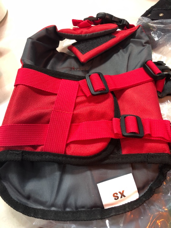 Photo 2 of High Visibility Small Dog Life Jacket Safety Vests for Swimming, Superior Buoyancy & Rescue Handle (XS (Chest Girth: 13"-14.2"), Bright Red)
