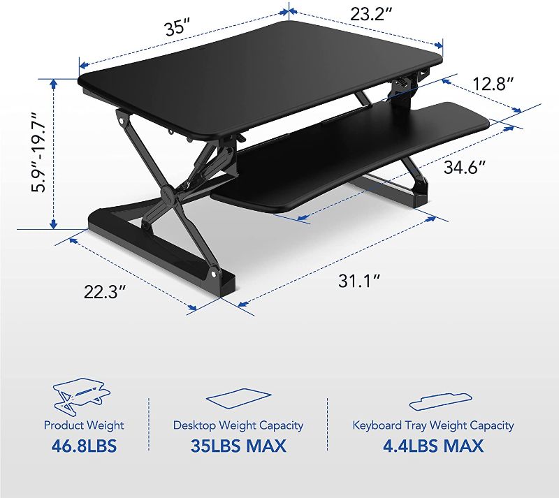 Photo 1 of FlexiSpot M2B Standing Desk Converter - 35 Inch wide platform Height Adjustable Stand up Desk Riser with Removable Keyboard Tray (Medium size Black)