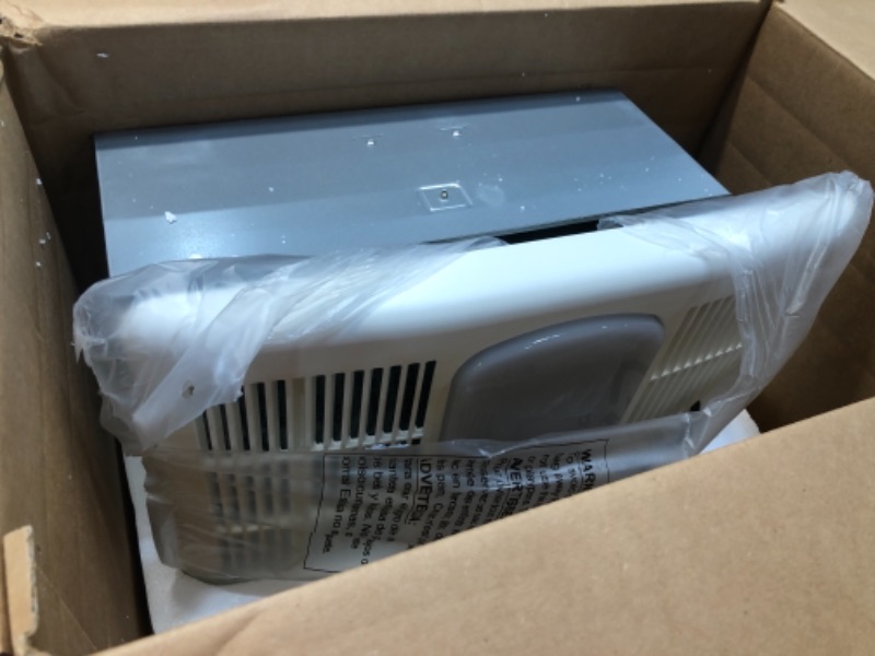 Photo 2 of Delta Electronics (Americas) Ltd. RAD80L Radiance 80 CFM Exhaust Light and Heater Ventilation Bath Fan, White
