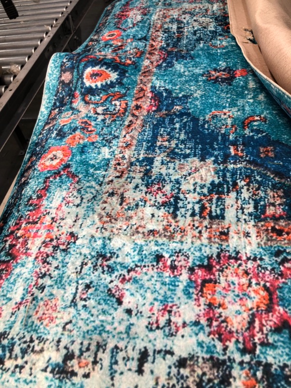 Photo 1 of 5x9 blue water resistant rug/mat 