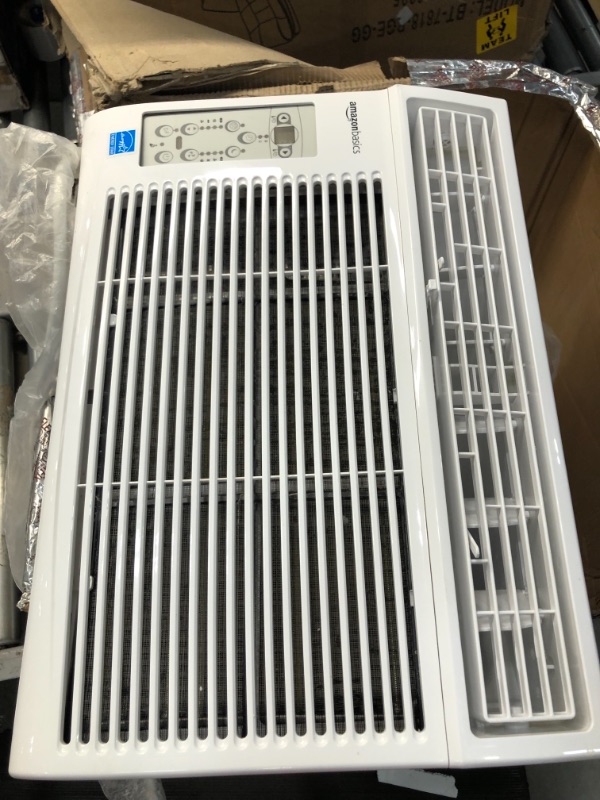 Photo 2 of Amazon Basics Window-Mounted Air Conditioner with Remote - Cools 450 Square Feet