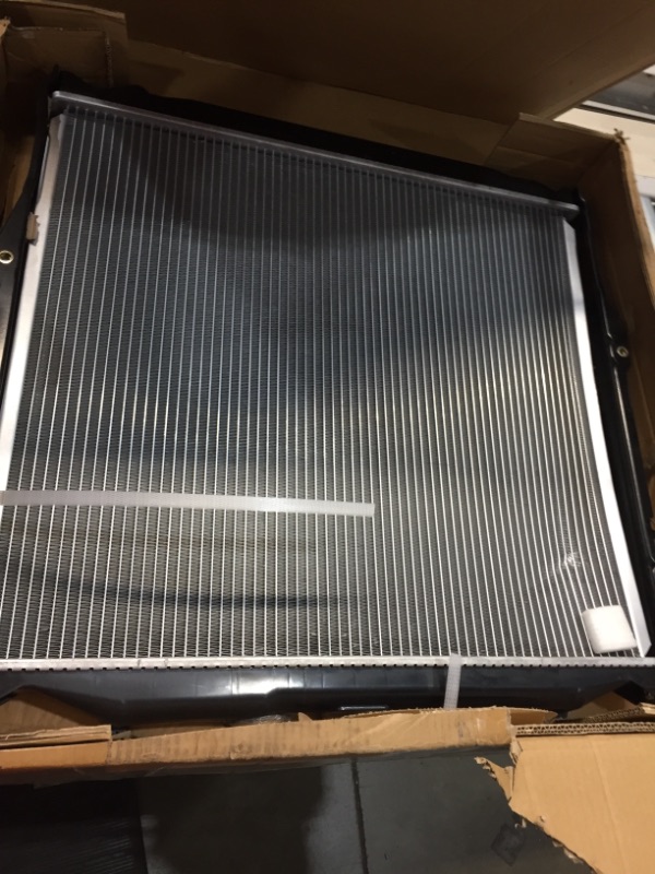 Photo 1 of mishimoto radiator UNKNOWN SIZE. SMALL DENT.