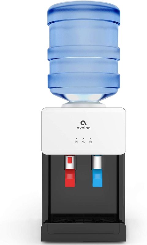Photo 1 of Avalon Premium Hot/Cold Top Loading Countertop Water Cooler Dispenser With Child Safety Lock. UL/Energy Star Approved- White - A1CTWTRCLRWHT WET FROM USE.
