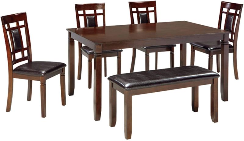 Photo 1 of Signature Design by Ashley Bennox Dining Room Set, Includes Table, 4 Chairs & Bench, Brown
