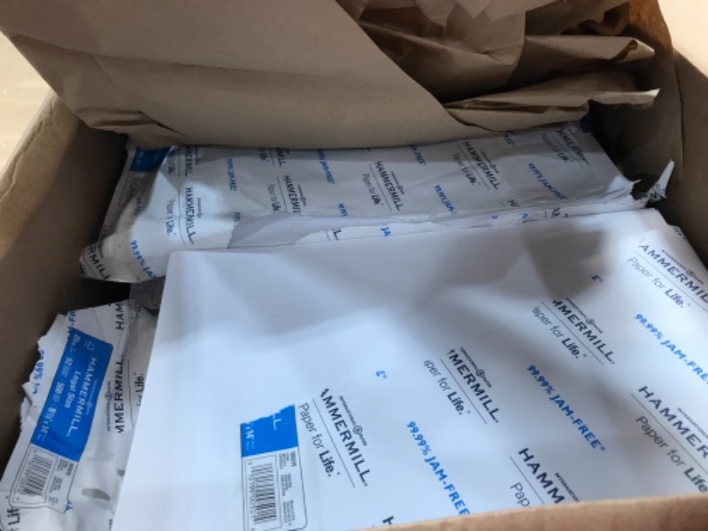 Photo 1 of box full of white printer paper; unknown exact number 