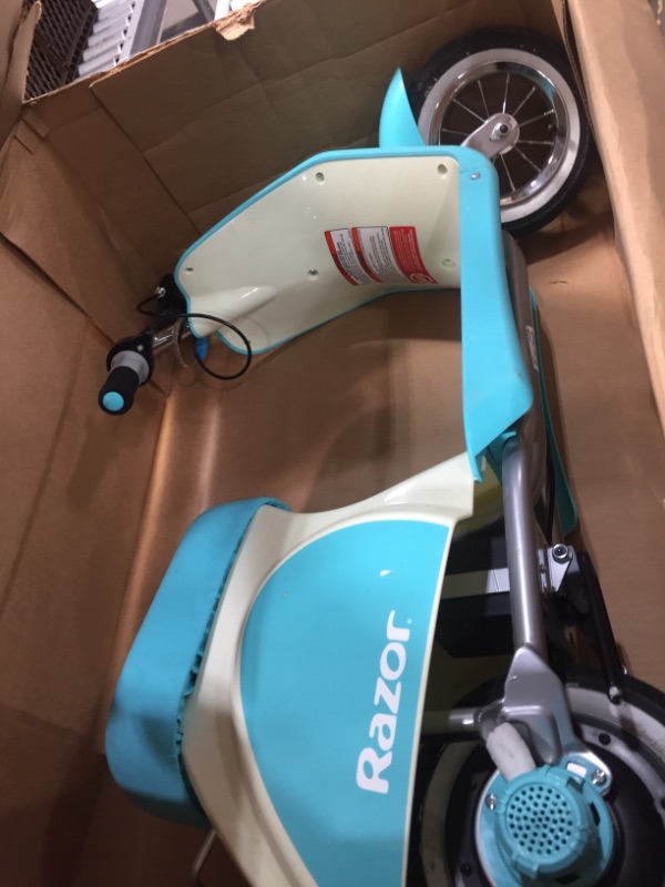 Photo 2 of Razor Pocket Mod Petite - 12V Miniature Euro-Style Electric Scooter for Ages 7 and Up, Hub-Driven Motor, Air-Filled White Wall Tires, Up to 40 min Ride Time, Blue
