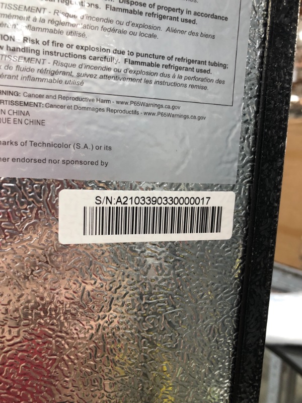 Photo 1 of RCA RFR725 EFR749 2 Door Apartment Size Refrigerator with Freezer, 7.5 cu. ft, Platinum, Stainless DAMAGE TO THE BOTTOM OF THE ITEM AND DOORS A SLIGHTLY BENT. COVER TO THE GASKET IS CRACKED ON TOP
