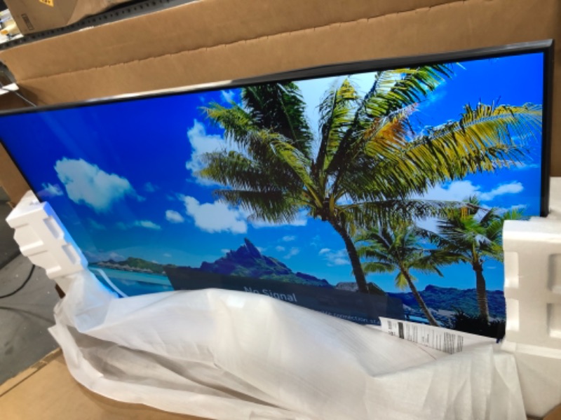 Photo 2 of ITEM IS DAMAGED ON TOP/ NOT THE SCREEN  
LG LED Smart TV 55" Slim Real 4k UHD NanoCell TV (3840 x 2160), Enhanced 4K, 60Hz Refresh Rate, 4K Cinema, Apps Enabled, Gaming Mode, Google/Alexa - 2021
Style:55NANO80UPA