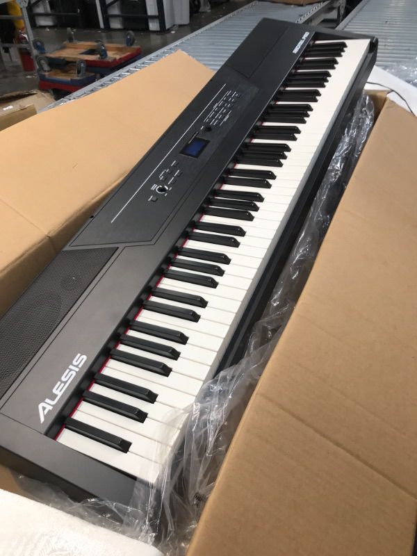 Photo 3 of Alesis Recital Pro  88 Key Digital Piano Keyboard with Hammer Action Weighted Keys 2x20W Speakers 12 Voices Record and Lesson Mode FX and Display