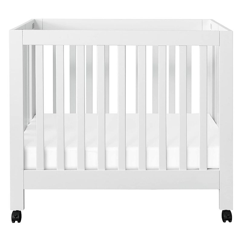 Photo 1 of Babyletto Origami Mini Portable Crib with Wheels in White, 2 Adjustable Mattress Positions, Greenguard Gold Certified
