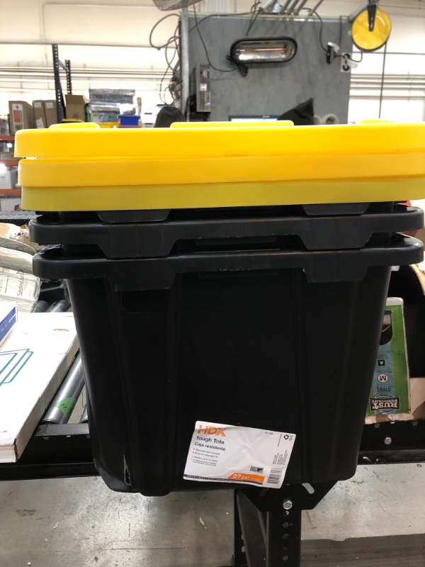 Photo 2 of **3 BOXES OF - 27 Gal. Tough Storage Tote in Black with Yellow Lid
