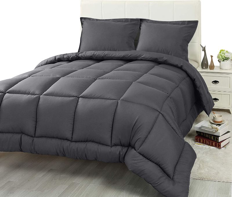 Photo 1 of *NOT EXACT stock picture, use for reference* 
*USED*
Comforter 90" x 90" Grey