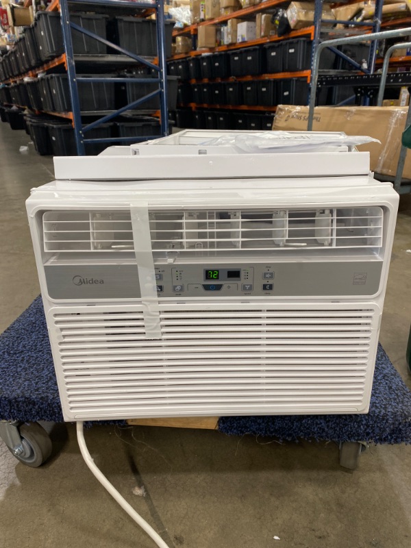 Photo 2 of  MIDEA EasyCool Window Air Conditioner - Cooling, Dehumidifier, Fan with remote control - 10, 000 BTU, Rooms up to 450 Sq. Ft. DAMGED
