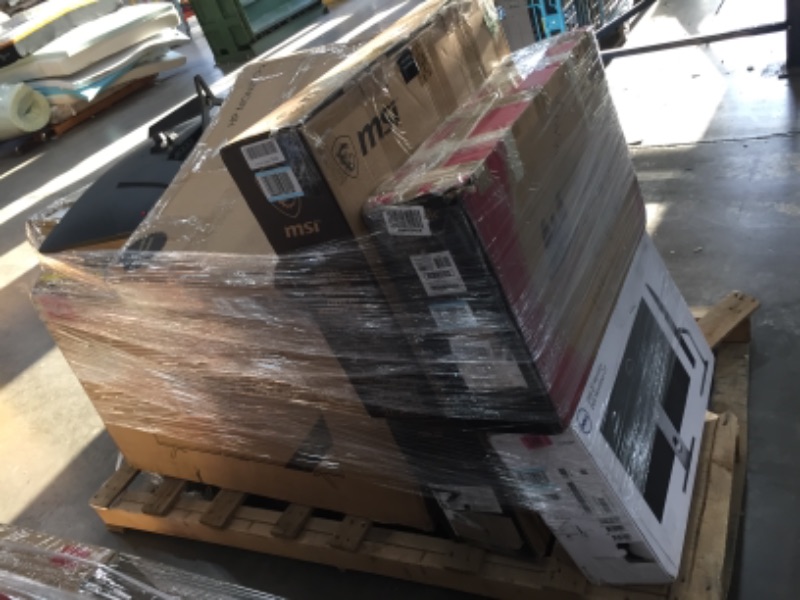 Photo 1 of Pallet of assorted broken T.V.s and monitors.