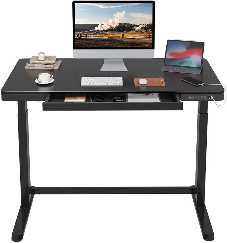 Photo 1 of FLEXISPOT Standing Desk with Drawers Electric Stand up Desk 48 x 24 Inches Black Desktop and Adjustable Frame Quick Install Home Office Table Comhar All-in-One (2.4A USB Charging Ports, Child Lock)
