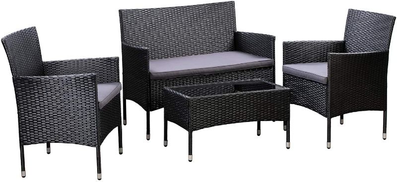 Photo 1 of Amazon Basics Outdoor Patio Garden Faux Wicker Rattan Chair Conversation Set with Cushion - 4-Piece Set, Black
