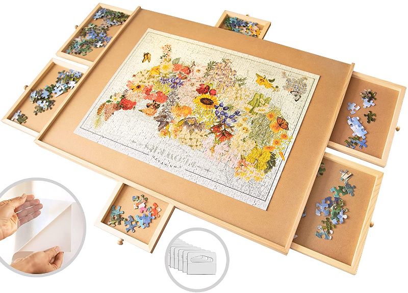 Photo 1 of 1500 Piece Wooden Jigsaw Puzzle Table - 6 Drawers, Puzzle Board + 9 Glue Sheets & 3 Hangers | 27” X 35” Jigsaw Puzzle Board Portable - Portable Puzzle Table | for Adults and Kids

//MINOR DAMAGE ON THE BACK, SIMILAR TO REFERENCE PHOTO 
