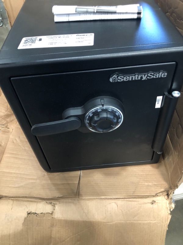 Photo 3 of ** NON FUNCTIONAL/ MISSING COMBO***
SentrySafe SFW123CU Fireproof Waterproof Safe with Dial Combination, 1.23 Cubic Feet, Black
