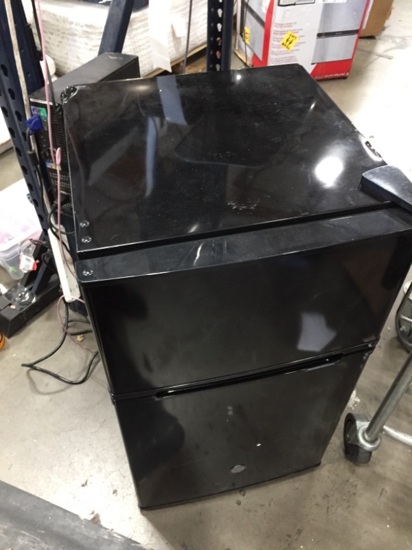 Photo 2 of ***PARTS ONLY*** 3.1 Cu. Ft. Mini Fridge with Built-In Freezer BLACK
POWERS ON