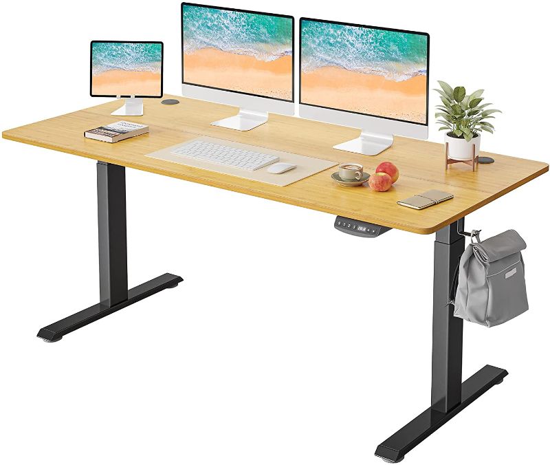 Photo 1 of FEZIBO Height Adjustable Electric Standing Desk, 55 x 24 Inches Stand up Table, Sit Stand Home Office Desk with Splice Board, Black Frame/Bamboo Top
